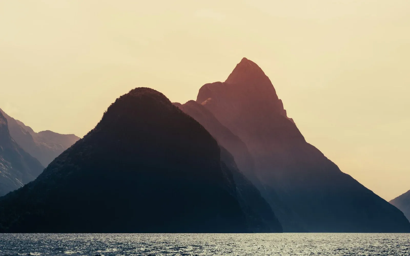 Mitre peak mountain silhouette at suset, Milford Sound