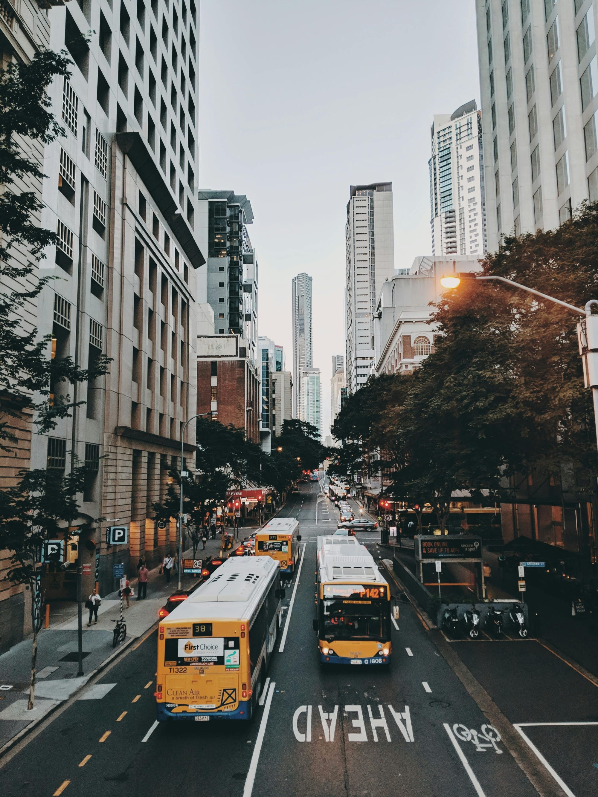 City buses driving through downtown Brisbane