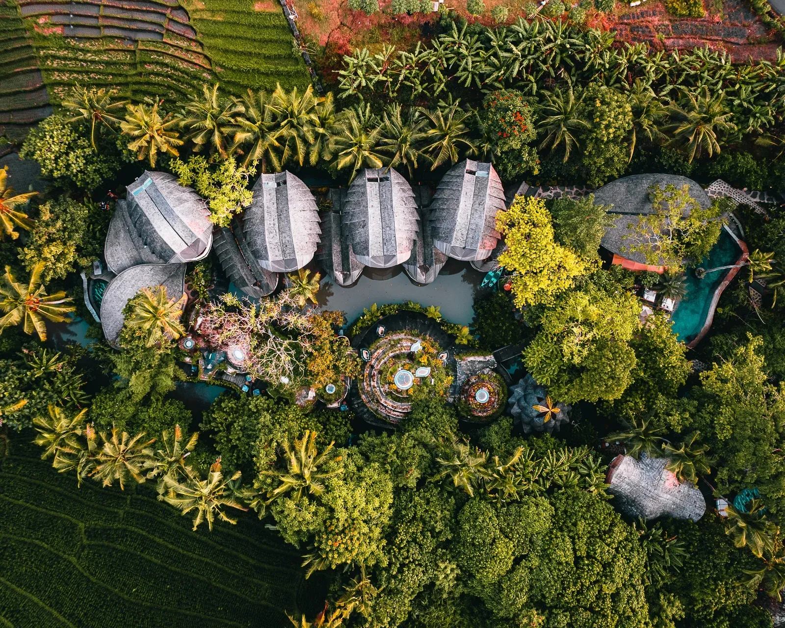 Top down aerial drone vie of bamboo villas at Ulaman Bali Eco Resort