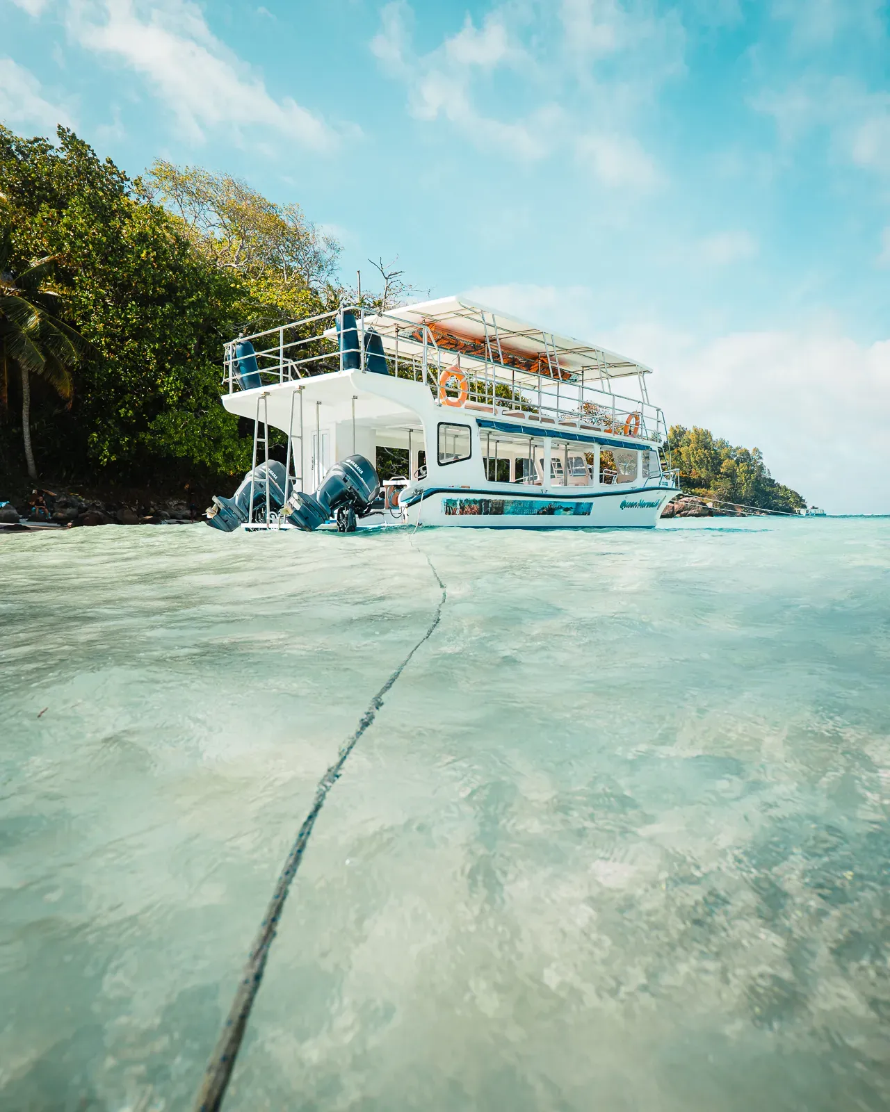 boat in clear turqoise water 