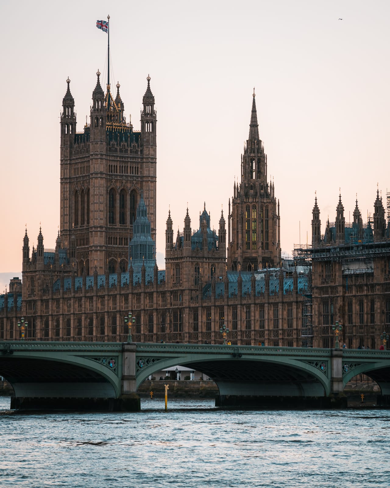 westminster abbey above bridge and water in london